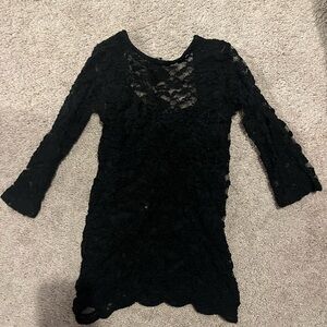 Woman’s black lace top